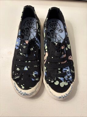 Rock & Candy Black Canvas Slip-On Sneakers with Blue, Green & Pink Splatter
